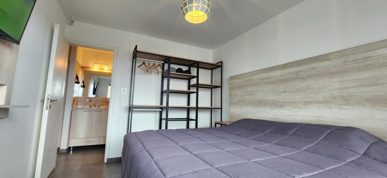 Pey Kau Apartment Ushuaia Bagian luar foto